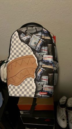 Spray ground backpack