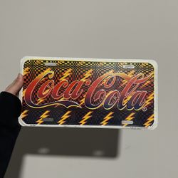 Coca cola tin sign and 12oz boxing gloves