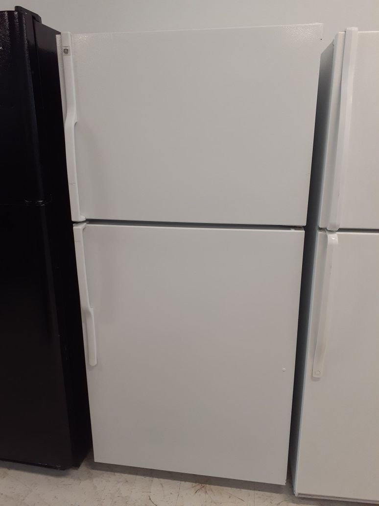Ge top freezer refrigerator in good condition with 90 day's warranty