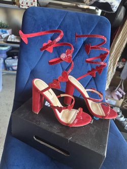 Heart wrap up heels size 6 firm on price