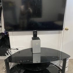65inc Smart Tv/ With Tv Stand
