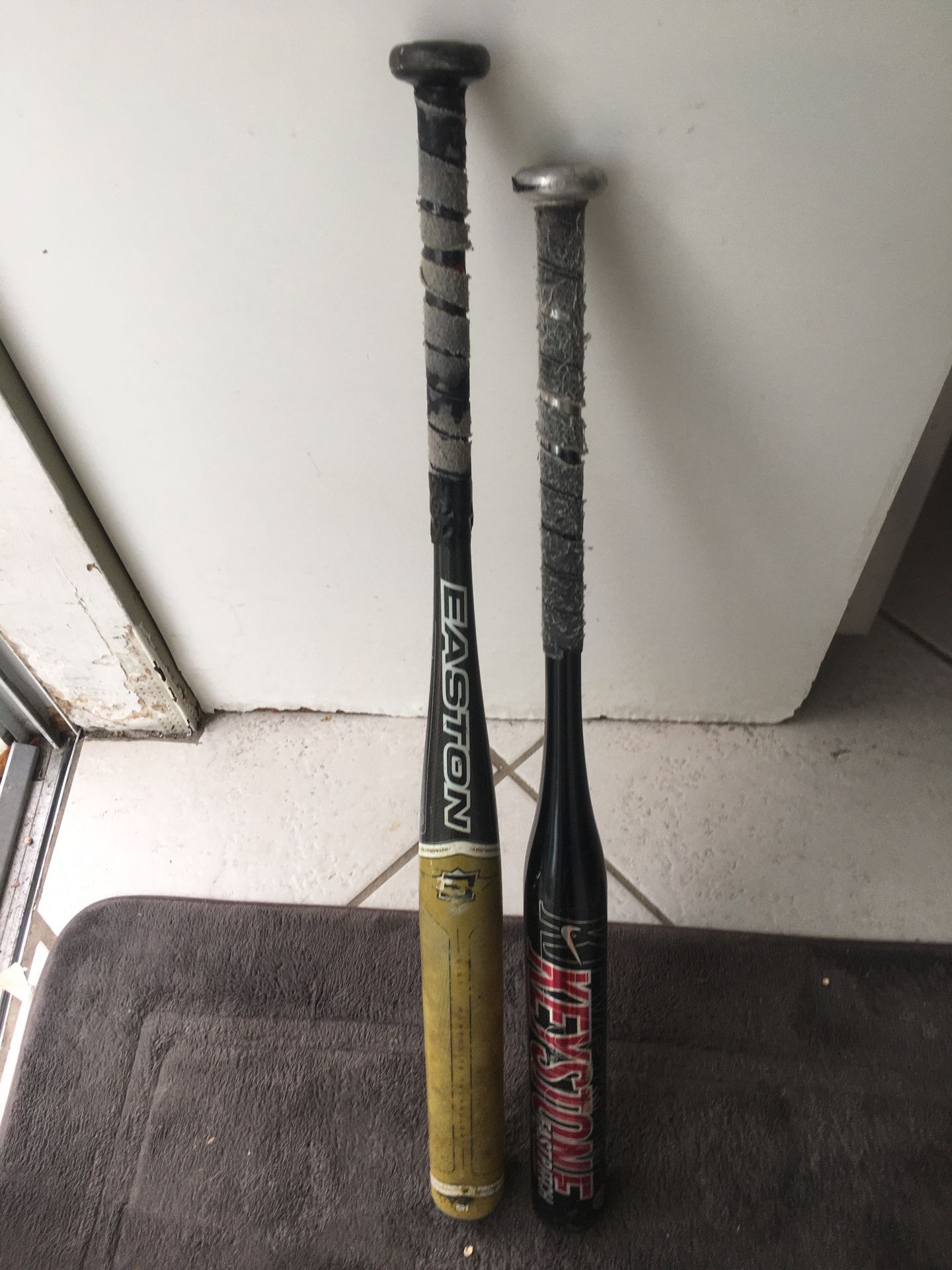 Nike and Easton Fastpitch softball bats