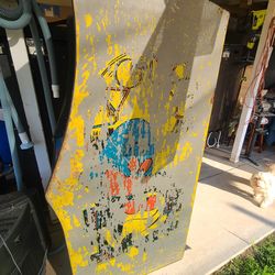 2 empty arcade game cabinets take both