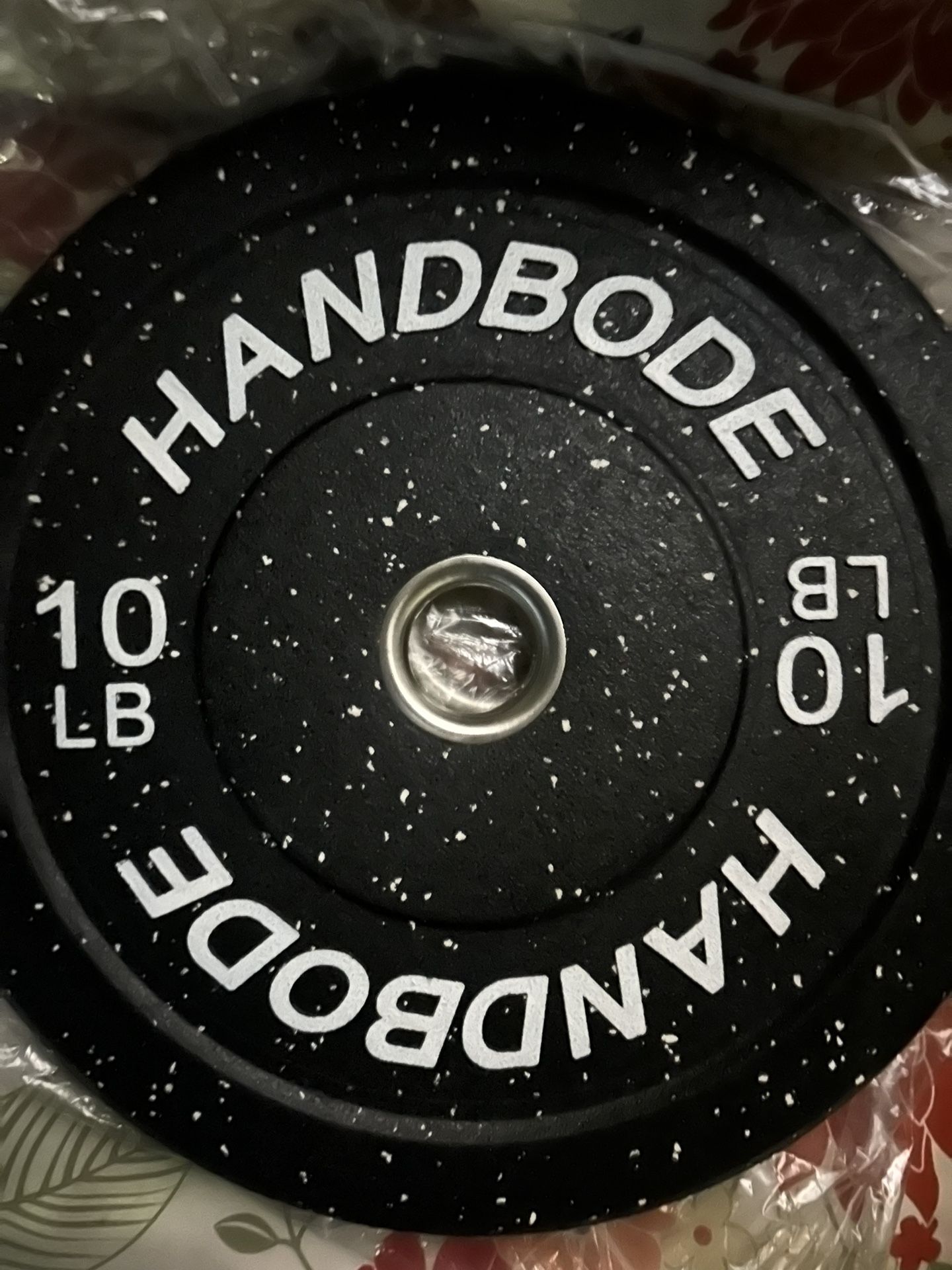 A pair of 10 pounds bumper plates