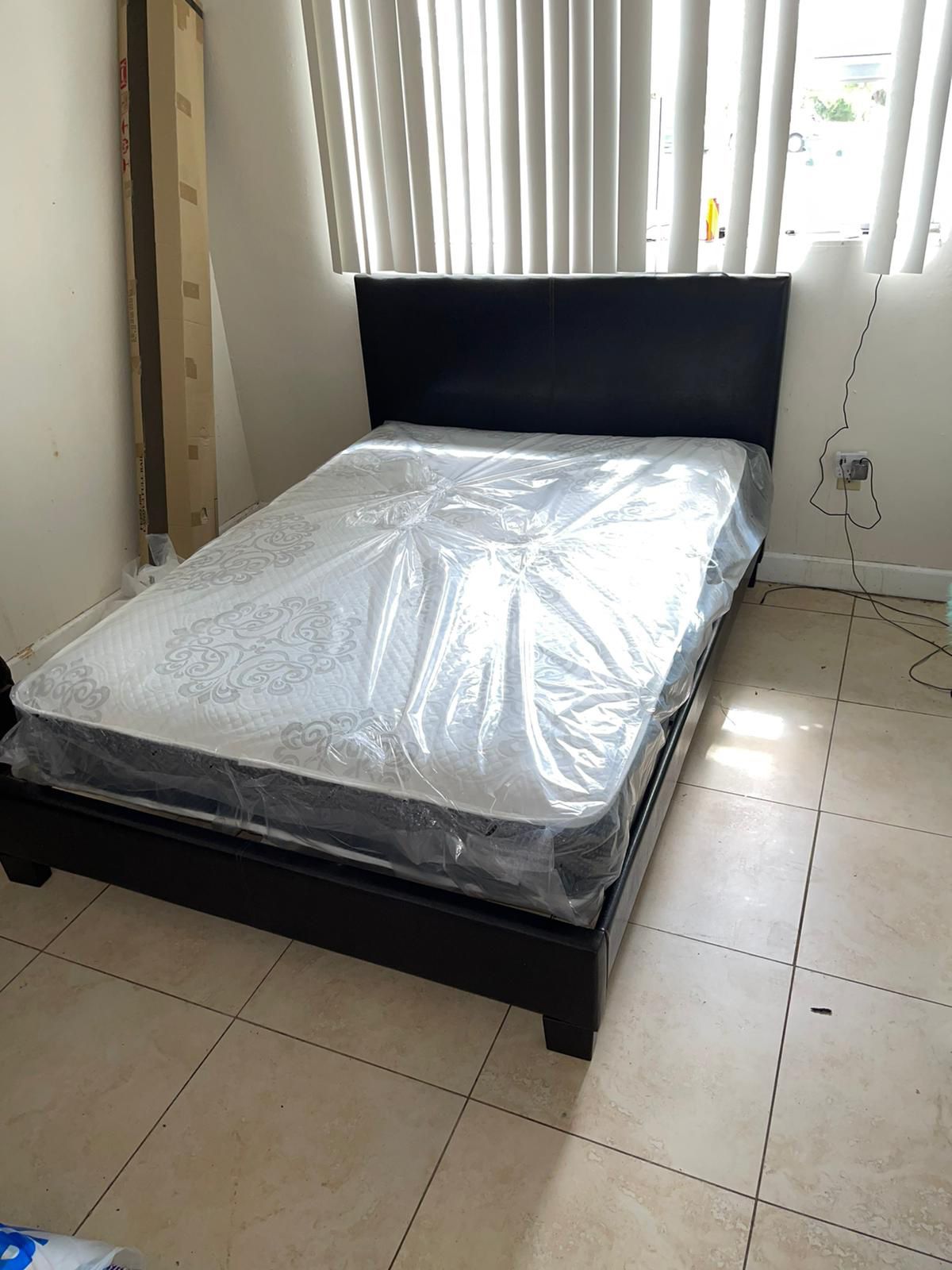 Full Size Bed. frame new in the box with the mattress free delivery   