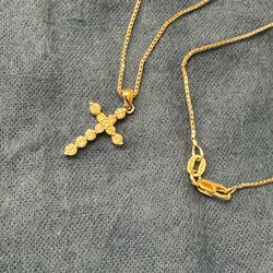 14 karat white gold box chain with 14 karat diamond cross pendant