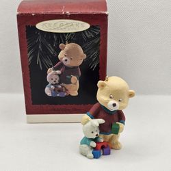Hallmark Keepsake Christmas Ornament child care giver babysitter bear blocks 
1996
Ornament is in great condition,  no flaws
Box has some storage wear
