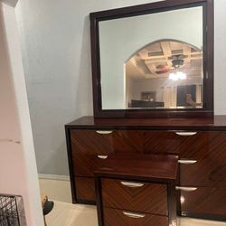 King size bedroom set for sale. Includes bed, mattress, dresser with removable mirror, and two night stands. Asking $475 O.B.O