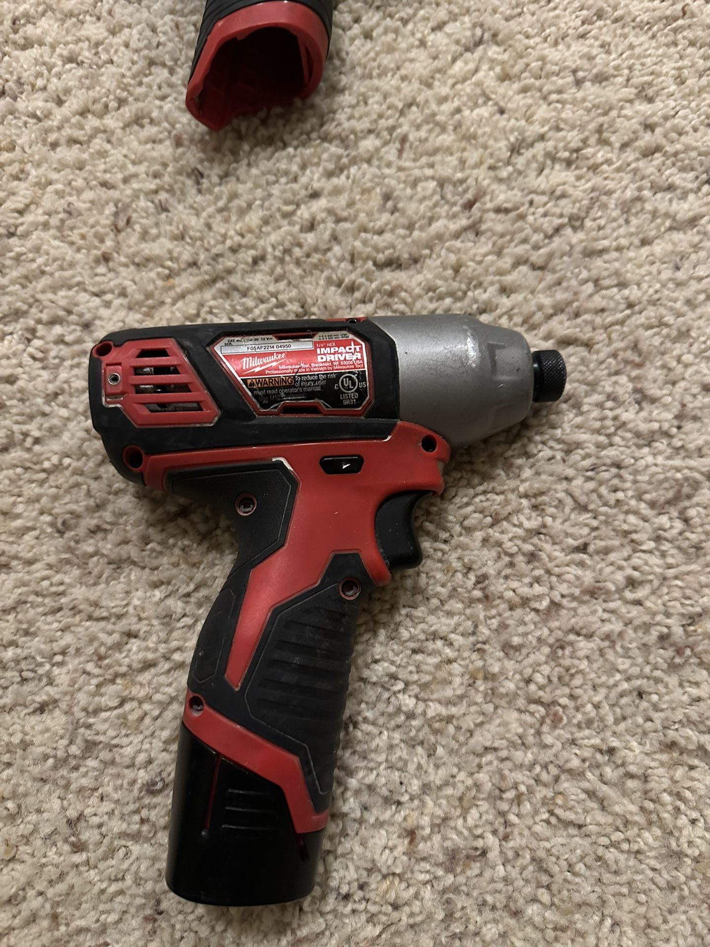 Milwaukee M12 1/4” Impact Driver with Battery — Used, Good Condition.