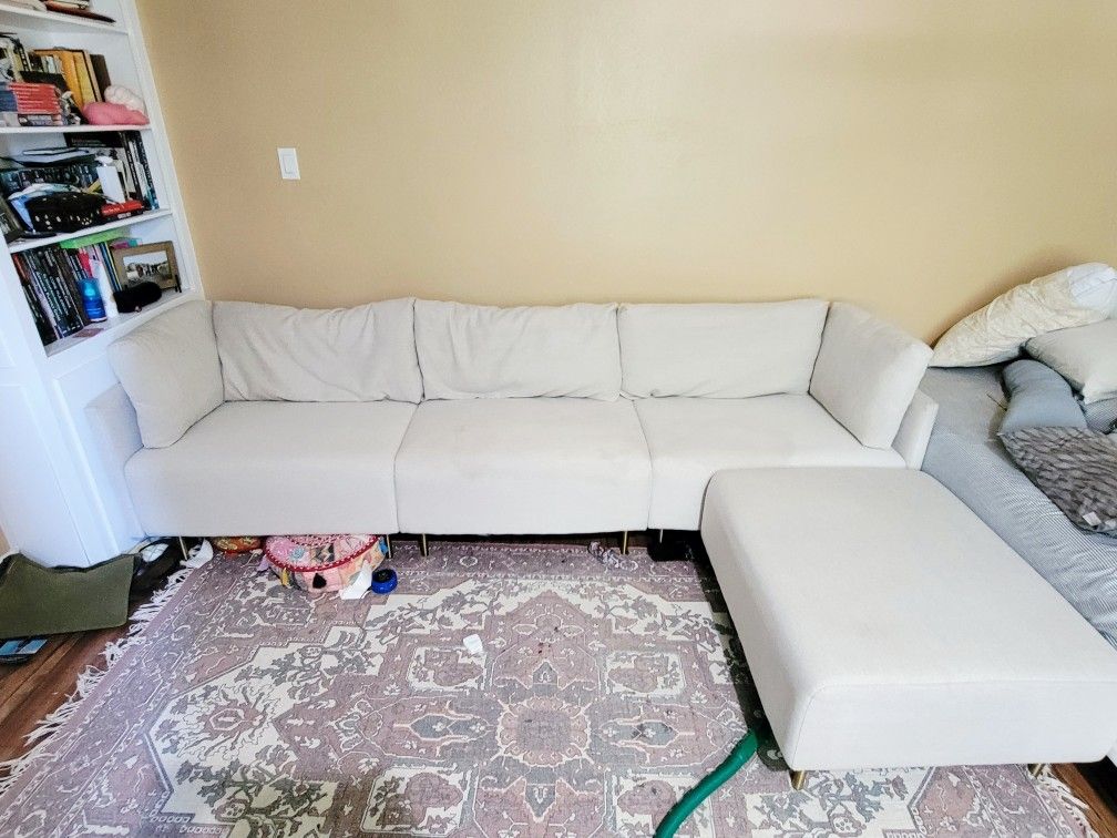 Wide modular sofa with ottoman