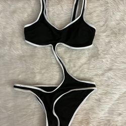 Black and white women’s swim wear one piece