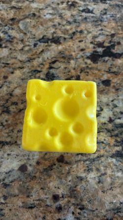 Two for 6 dollars cheese squishy and butter squishy