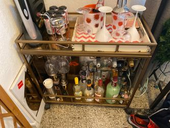 Bar cart with matching wall mirror