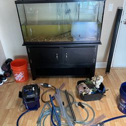 65 Gallon Fish Tank with Stand. All cleaning components included.