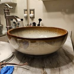 Southwestern Vessel Bathroom Sink With Waterfall Faucet