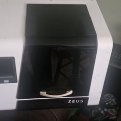 AIO Robotics ZEUS 3d Printer Scanner  Sold AS-IS 
I don't have the power supply 
I have two  available 
Exellent Condition 
But I don't know the worki