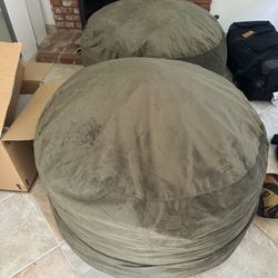 Two very lightly used beanbags. They’re filled with memory foam not beans.