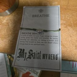 My Saint My Hero Breathe Bracelet Made With Silver Plated Metal On Olive Hand Woven Cord Made In Scotland