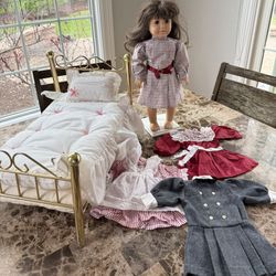 American Girl Doll Samantha Pleasant Company Original Doll, Bed, and 4 dresses.