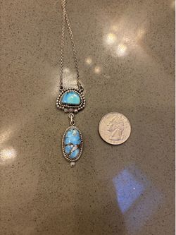 turquoise and silver pendant