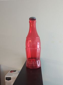 Coke bottle piggy bank