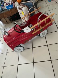 FIRE PEDAL TRUCK ALMOST NEW!  USED ONLY SOMETIMES! BEAUTIFUL TRUCK!
