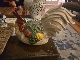 Collection of porcelain hens and roosters all in pristine condition