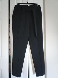 Black High-rise, straight-leg trousers featuring a self-tie waist belt. Size 2