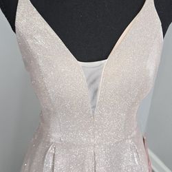 Pink sparkly maxi dress with V-neck and pleated skirt