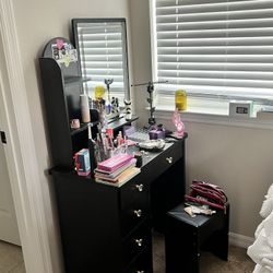 black vanity with light 