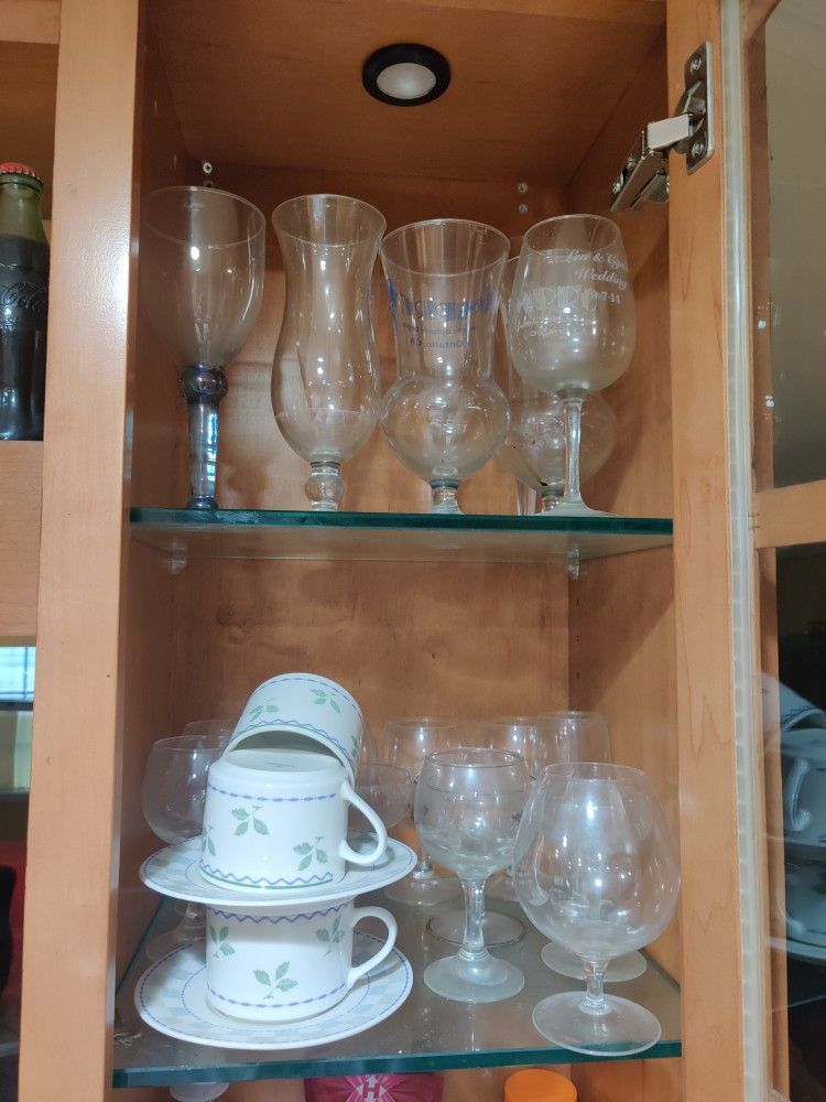 Assorted Glassware: wine glasses, goblets, and teacups
