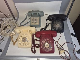 Four Old Telephones