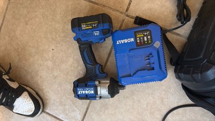 Battery charger and 1/2 impact 200