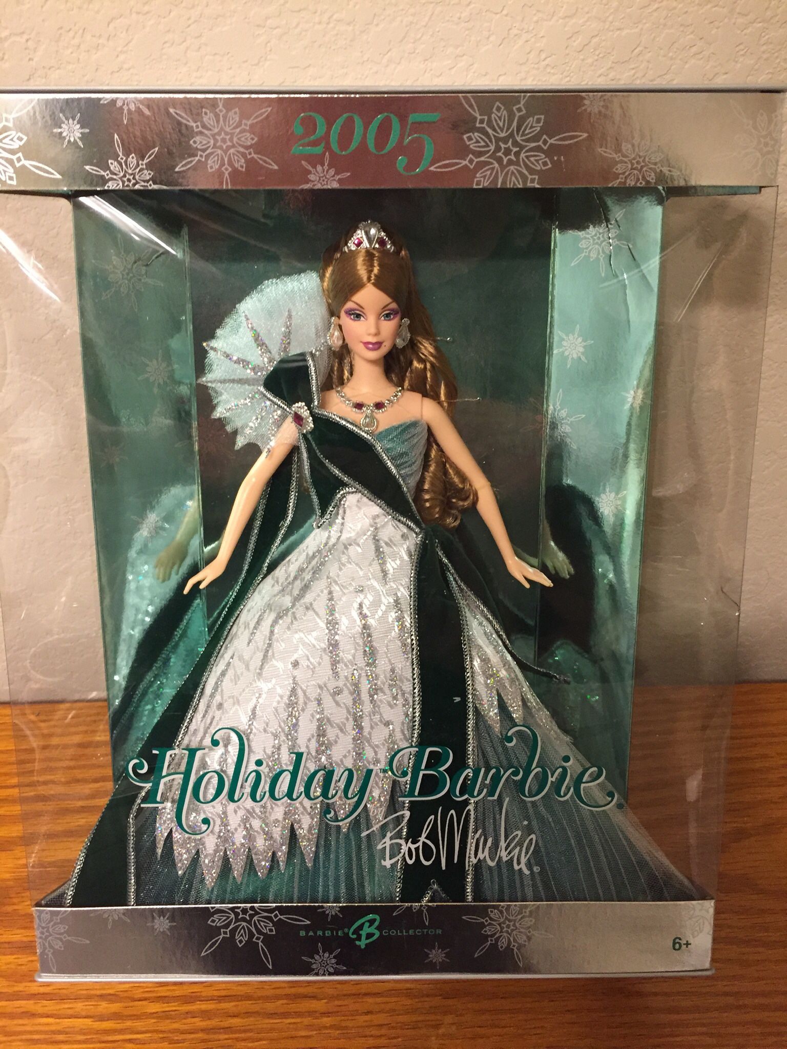 Collectible Holiday Barbie 2005 by famed designer to the stars, Bob Mackie.