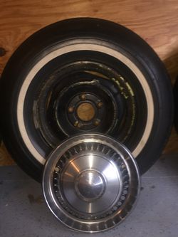 Tires, rims, hub caps from 1970 chevelle