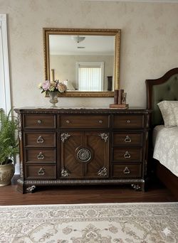 Timeless Elegance: Stunning Nine-Drawer Dresser with Intricate Detail