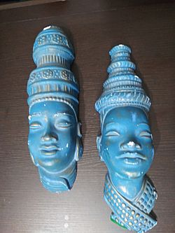 Awesome Handmade. Chipped, but can easily be repainted and won't be noticeable.
