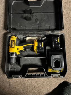 DeWalt 12V cordless (similar to model DC742KA), stored in its original hard case along with its tower batteries and charger