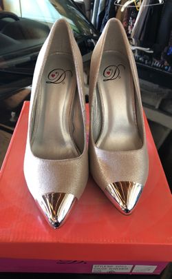 Size 6 silver pumps