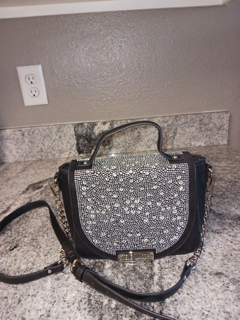 PURSES STEVE MADDEN, DKNY CALVIN KLEIN EACH 25$