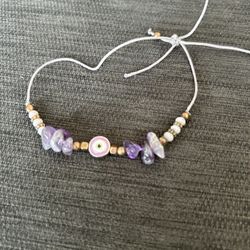 Purple and gold beaded bracelet 