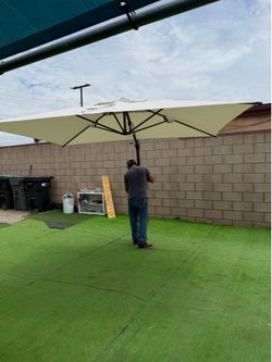 Cantilever umbrella new (available beige -red color) $$90