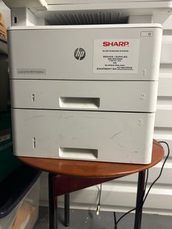 Sharp Commercial grade printer. Works excellent
