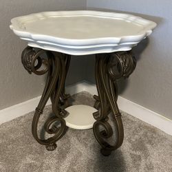 Elegant White & Bronze Accent Table – Metal Scroll Base