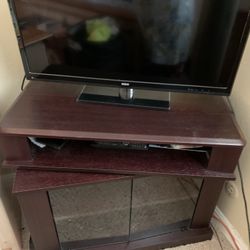 Swivel Top Tv Stand Dark Brown With 2 Glass Doors  And Shelves For Storage
