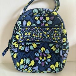 Vera Bradley small bag 7” wide, 9” tall, 4” width.  Preowned in great condition. Cones from a smoke free environment.  