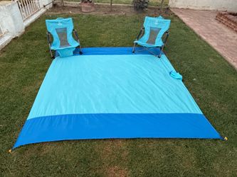 Beach mat and chairs