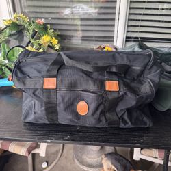 Christian Dior black canvas Duffle Bag Vintage leather handles 80's retro