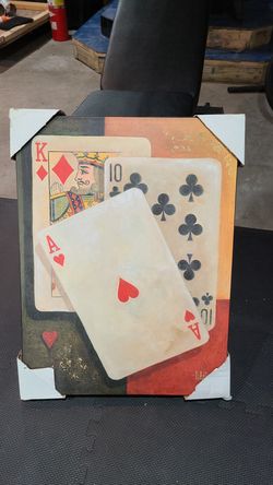 Poker paintings and wooden sign