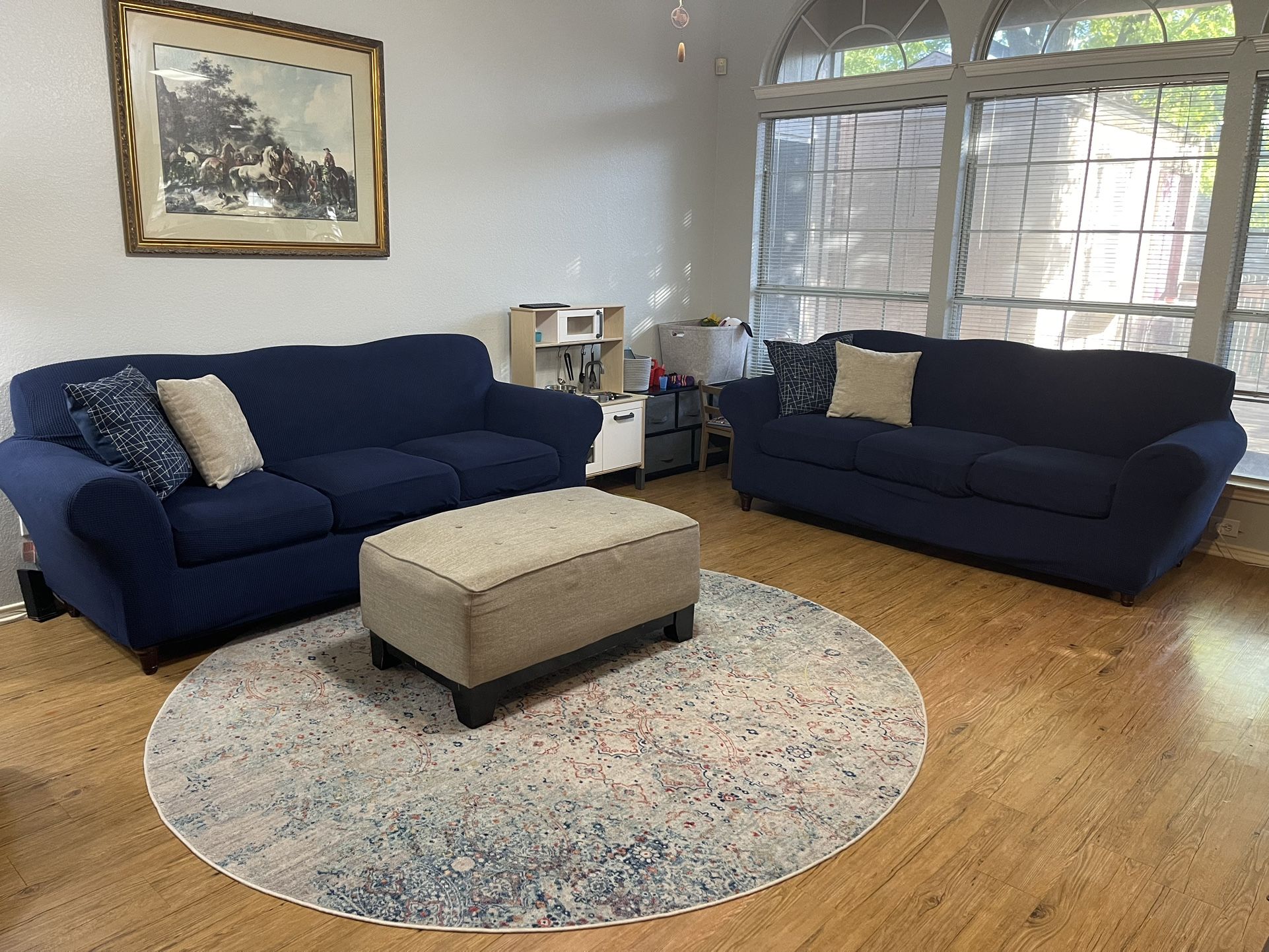 (2) Cream Sofas in Navy Slipcover